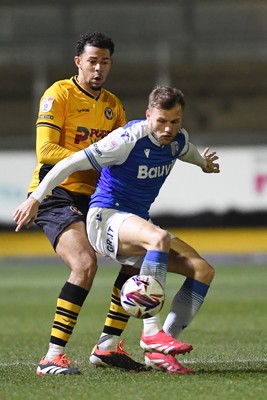 040325 - Newport County v Gillingham - Sky Bet League 2 - Jaden Warner of Newport County is challenged by Elliott Nevitt of Gillingham