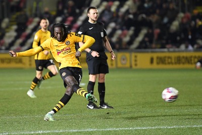 040325 - Newport County v Gillingham - Sky Bet League 2 - Cameron Antwi of Newport County has a shot at goal which is deflected in by Bobby Kamwa