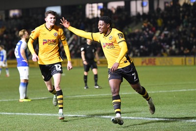 040325 - Newport County v Gillingham - Sky Bet League 2 - Bobby Kamwa of Newport County celebrates scoring his third goal and completes his first half hat-trick 