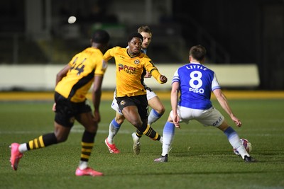 040325 - Newport County v Gillingham - Sky Bet League 2 - Bobby Kamwa of Newport County is challenged by Armani Little of Gillingham