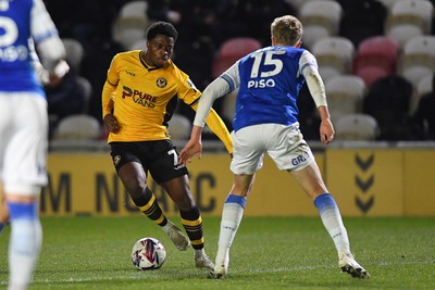 040325 - Newport County v Gillingham - Sky Bet League 2 - Bobby Kamwa of Newport County is challenged by Andy Smith of Gillingham