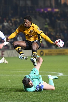 040325 - Newport County v Gillingham - Sky Bet League 2 - Bobby Kamwa of Newport County puts the ball past Glenn Morris of Gillingham but can’t score