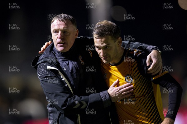 191122 - Newport County v Gillingham - Sky Bet League 2 - Newport County manager Graham Coughlin with Mickey Demetriou of Newport County at full time