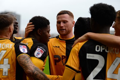 200925 - Newport County v Gillingham - Sky Bet League 2 - Nathan Opoku of Newport County celebrates scoring a goal with team mates