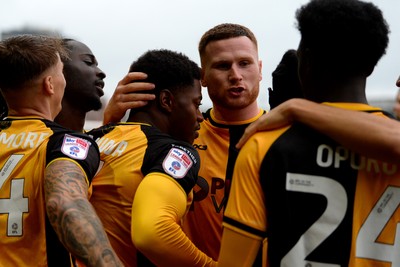 200925 - Newport County v Gillingham - Sky Bet League 2 - Nathan Opoku of Newport County celebrates scoring a goal with team mates
