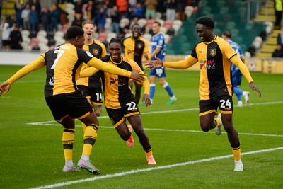 200925 - Newport County v Gillingham - Sky Bet League 2 - Nathan Opoku of Newport County celebrates scoring a goal with team mates