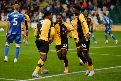 200925 - Newport County v Gillingham - Sky Bet League 2 - Nathan Opoku of Newport County celebrates scoring a goal with team mates