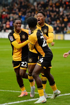 200925 - Newport County v Gillingham - Sky Bet League 2 - Nathan Opoku of Newport County celebrates scoring a goal with team mates