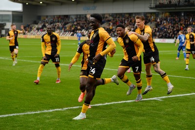 200925 - Newport County v Gillingham - Sky Bet League 2 - Nathan Opoku of Newport County celebrates scoring a goal with team mates