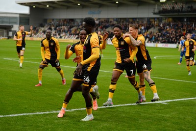 200925 - Newport County v Gillingham - Sky Bet League 2 - Nathan Opoku of Newport County celebrates scoring a goal with team mates