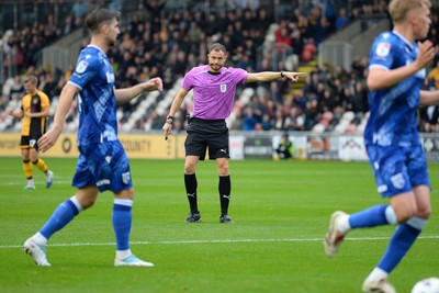 200925 - Newport County v Gillingham - Sky Bet League 2 - Cameron Antwi of Newport County is fouled in the box by Andy Smith of Gillingham and receives a penalty