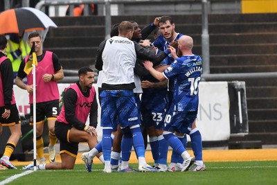 200925 - Newport County v Gillingham - Sky Bet League 2 - Shadrach Ogie of Gillingham celebrates scoring a goal with team mates