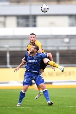 200925 - Newport County v Gillingham - Sky Bet League 2 - Lee Jenkins of Newport County is challenged by Josh Andrews of Gillingham
