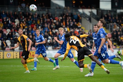 200925 - Newport County v Gillingham - Sky Bet League 2 - Nathan Opoku of Newport County has a headed shot on target