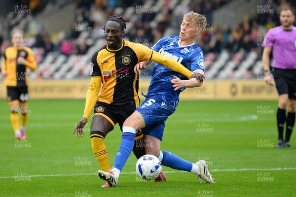 200925 - Newport County v Gillingham - Sky Bet League 2 - Cameron Antwi of Newport County is fouled in the box by Andy Smith of Gillingham and receives a penalty