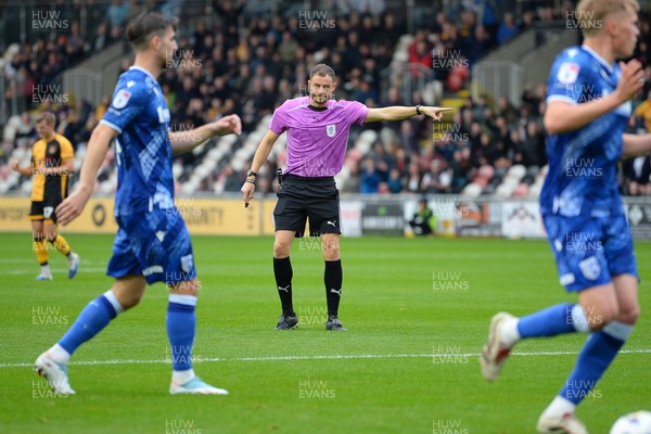 200925 - Newport County v Gillingham - Sky Bet League 2 - Cameron Antwi of Newport County is fouled in the box by Andy Smith of Gillingham and receives a penalty