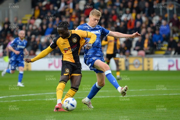 200925 - Newport County v Gillingham - Sky Bet League 2 - Cameron Antwi of Newport County is fouled in the box by Andy Smith of Gillingham and receives a penalty
