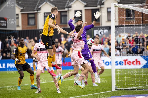 030922 - Newport County v Grimsby Town - Sky Bet League 2 - Cameron Norman of Newport County rises at the far post