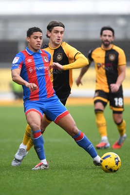 070226 - Newport County v Grimsby Town - Sky Bet League 2 - Harrison Biggins of Newport County is challenged by Evan Khouri of Grimsby