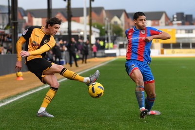 070226 - Newport County v Grimsby Town - Sky Bet League 2 - Harrison Biggins of Newport County has his shot blocked by Evan Khouri of Grimsby