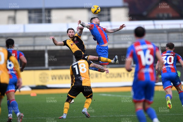 070226 - Newport County v Grimsby Town - Sky Bet League 2 - Matthew Baker of Newport County heads the ball