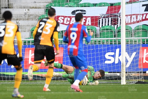 070226 - Newport County v Grimsby Town - Sky Bet League 2 - Jordan Wright of Newport County saves the penalty from Jaze Kabia of Grimsby