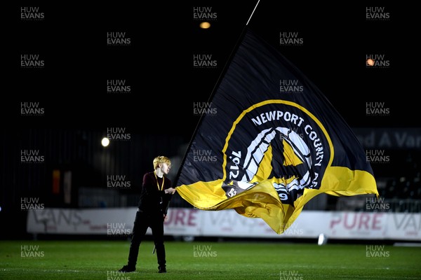 201119 - Newport County v Grimsby Town - FA Cup - A club flag is waved before kick off