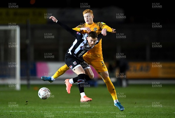 201119 - Newport County v Grimsby Town - FA Cup - Jordan Cook of Grimsby Town is tackled by Ryan Haynes of Newport County