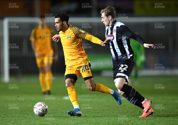 201119 - Newport County v Grimsby Town - FA Cup - Corey Whitely of Newport County is challenged by Elliott Hewitt of Grimsby Town