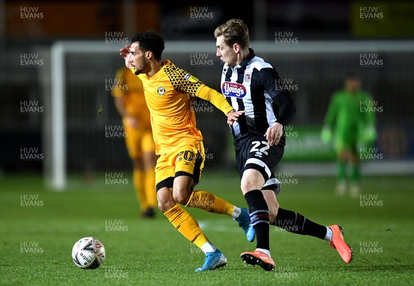 201119 - Newport County v Grimsby Town - FA Cup - Corey Whitely of Newport County is challenged by Elliott Hewitt of Grimsby Town