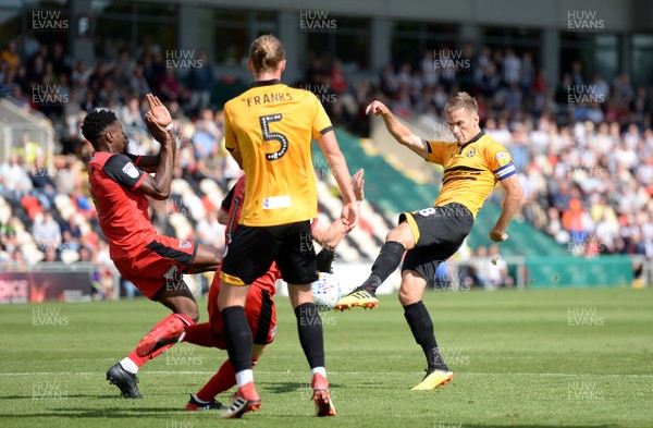 250818 - Newport County v Grimsby Town - SkyBet League 2 - Mickey Demetriou of Newport County tries a shot at goal