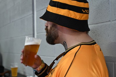 260926 - Newport County v Grimsby Town - Sky Bet League 2 - Newport fans under the stands with Alcohol after Andy Burnham, Prime Minister claims he may lift a ban on Alcohol in Football stands