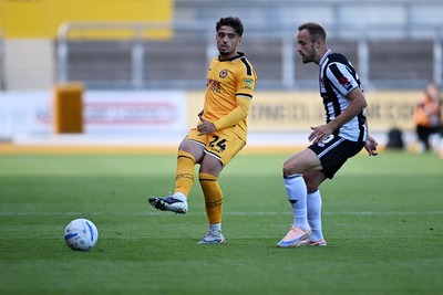 260926 - Newport County v Grimsby Town - Sky Bet League 2 - Matt Dibley-Dias of Newport County is challenged by Charles Vernam of Grimsby