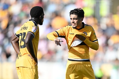 260926 - Newport County v Grimsby Town - Sky Bet League 2 - Michael Adu-Poku of Newport County and Matt Dibley-Dias of Newport County