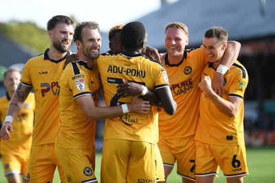 260926 - Newport County v Grimsby Town - Sky Bet League 2 - Shaquille Gwengwe of Newport County celebrates scoring a goal with team mates