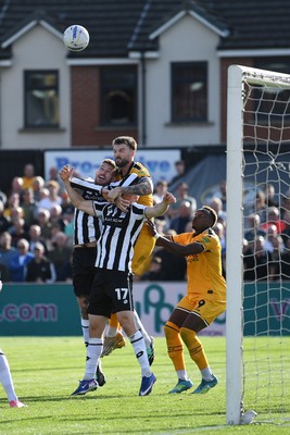 260926 - Newport County v Grimsby Town - Sky Bet League 2 - Kyle Cameron of Newport County heads on goal