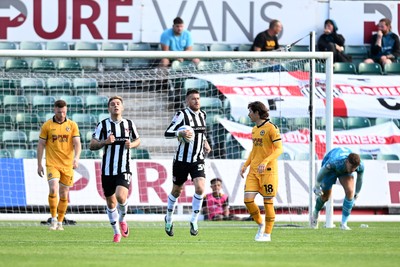 260926 - Newport County v Grimsby Town - Sky Bet League 2 - Jordan Wright of Newport County reacts after making a mistake to concede a goal