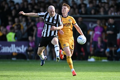 260926 - Newport County v Grimsby Town - Sky Bet League 2 - Ged Garner of Newport County is challenged by Cameron McJannet of Grimsby