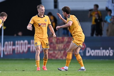 260926 - Newport County v Grimsby Town - Sky Bet League 2 - Matty Jacob of Newport County and Harrison Biggins of Newport County celebrate on the final whistle