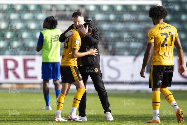 071023 - Newport County v Harrogate Town - Sky Bet League 2 - Newport County manager Graham Coughlan with Kiban Rai of Newport County at full time