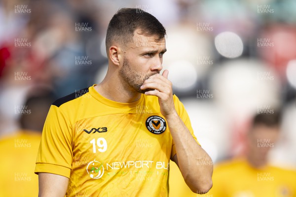 071023 - Newport County v Harrogate Town - Sky Bet League 2 - Shane McLoughlin of Newport County during the warm up