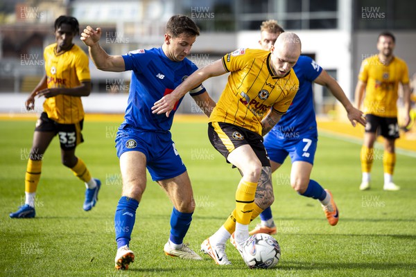 071023 - Newport County v Harrogate Town - Sky Bet League 2 - James Waite of Newport County in action against Josh Falkingham of Harrogate Town