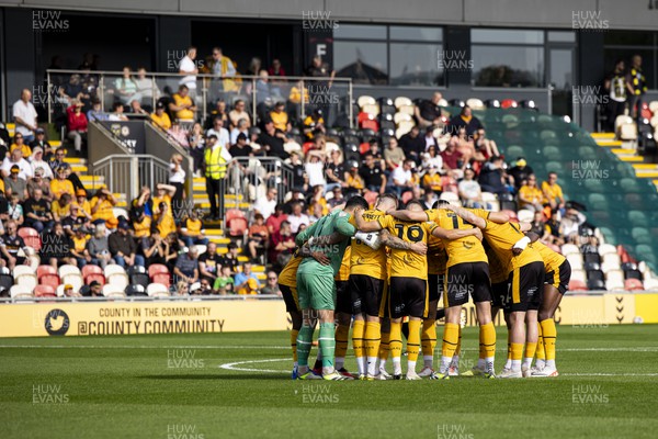 071023 - Newport County v Harrogate Town - Sky Bet League 2 - Newport County huddle ahead of kick off