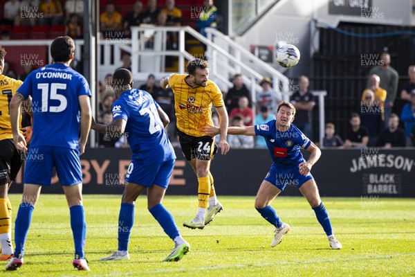 071023 - Newport County v Harrogate Town - Sky Bet League 2 - Aaron Wildig of Newport County with a late header on goal