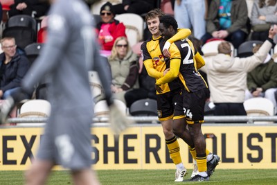 110426 - Newport County v Harrogate Town - Sky Bet League 2 - Nathan Opoku of Newport County celebrates scoring his sides first goal with Ben Lloyd