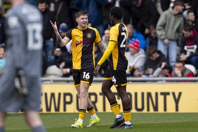 110426 - Newport County v Harrogate Town - Sky Bet League 2 - Nathan Opoku of Newport County celebrates scoring his sides first goal with James Crole