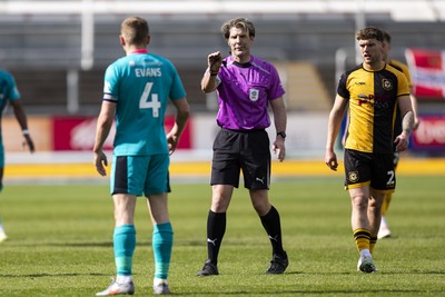 110426 - Newport County v Harrogate Town - Sky Bet League 2 - Referee Neil Hair with Jack Evans of Harrogate Town