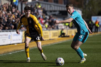 110426 - Newport County v Harrogate Town - Sky Bet League 2 - Joe Thomas of Newport County in action against Bryn Morris of Harrogate Town
