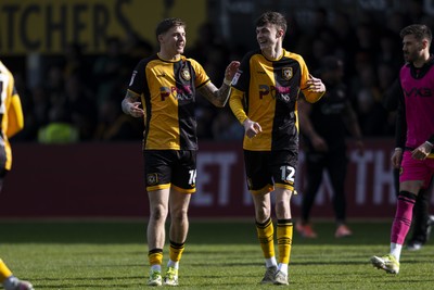 110426 - Newport County v Harrogate Town - Sky Bet League 2 - James Crole of Newport County with Joe Thomas of Newport County at full time