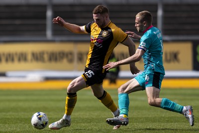 110426 - Newport County v Harrogate Town - Sky Bet League 2 - Lee Jenkins of Newport County in action against Bryn Morris of Harrogate Town